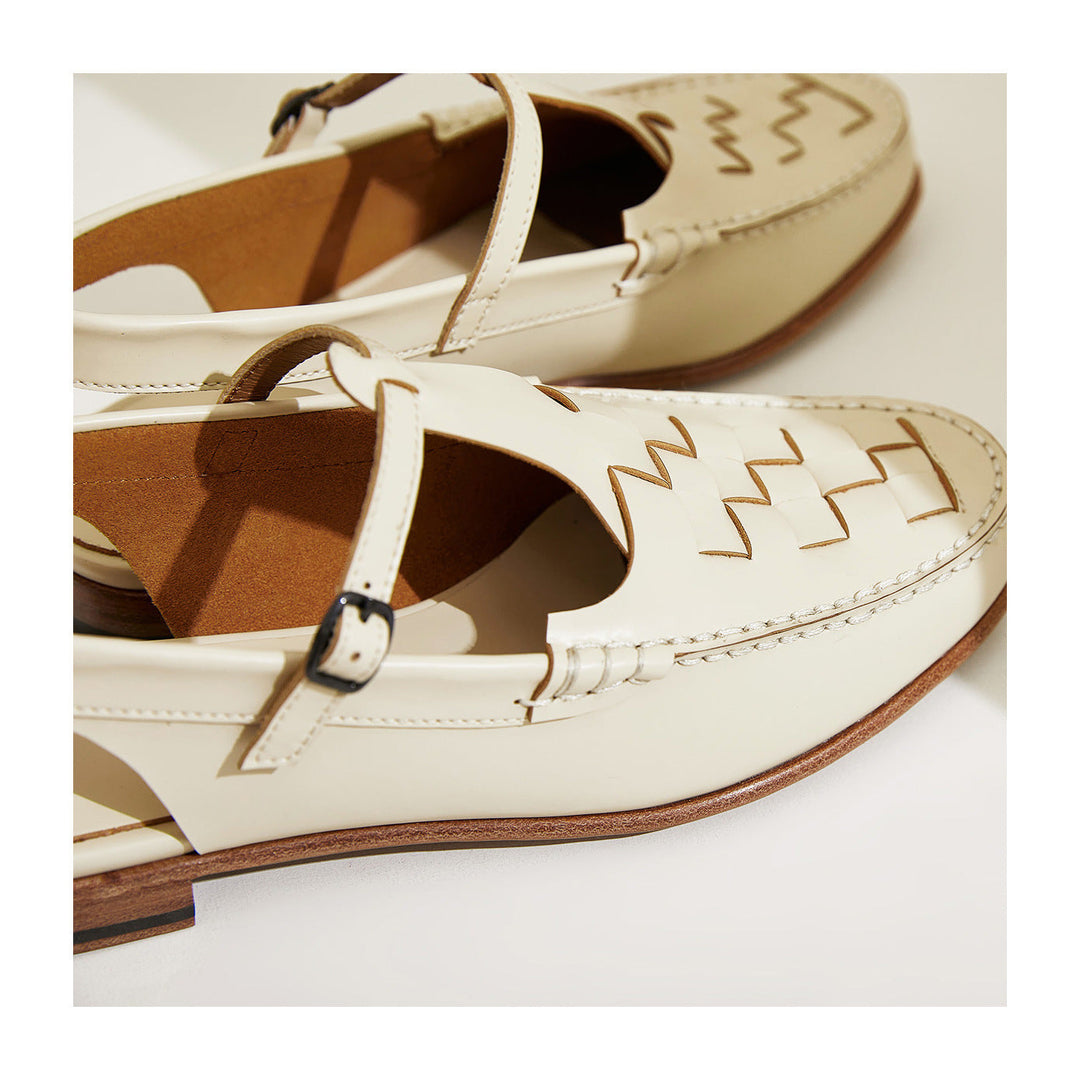 Eliara™ Woven Charm Sandals