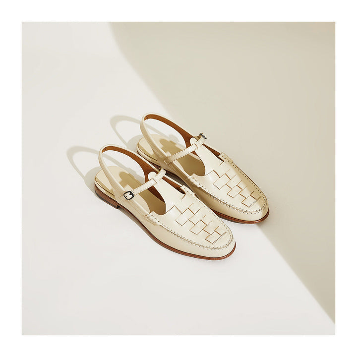 Eliara™ Woven Charm Sandals