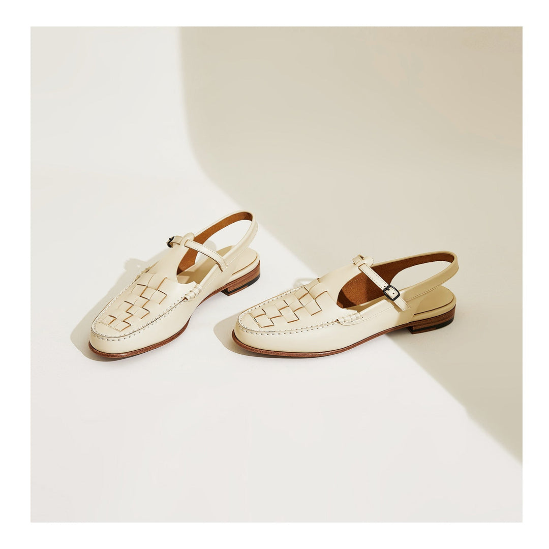 Eliara™ Woven Charm Sandals